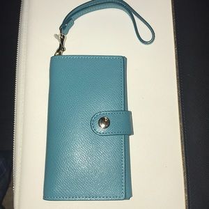 Coach wristlet. Holds cell phone. Brand new.